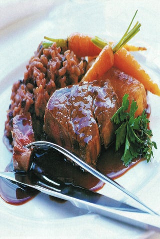 Beef fillet with currant risotto and thyme beef jus